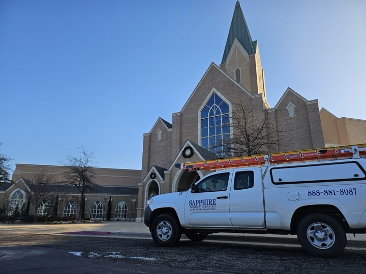 A Sapphire truck parked outside a church